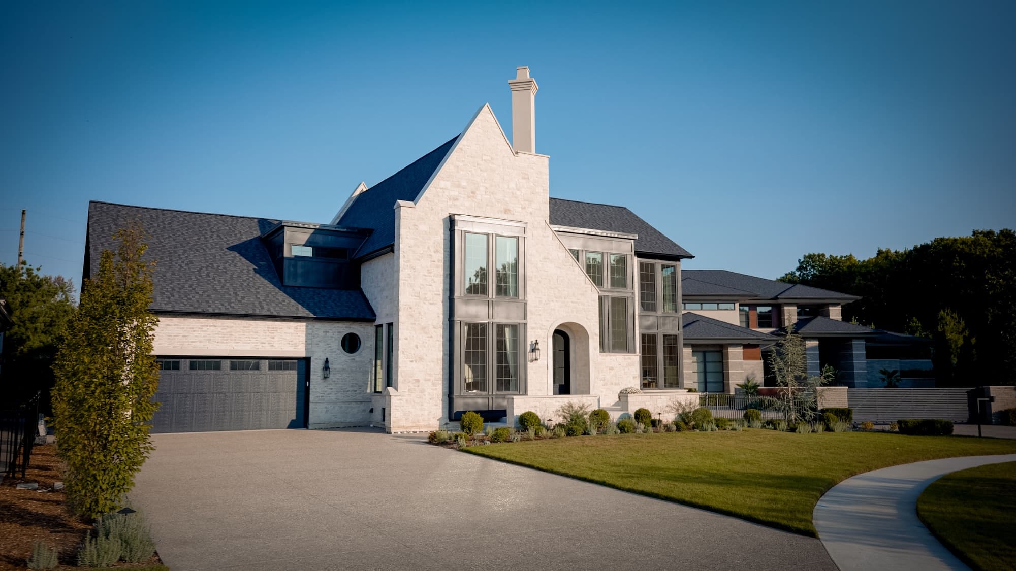 Waterfront living room with vaulted ceiling