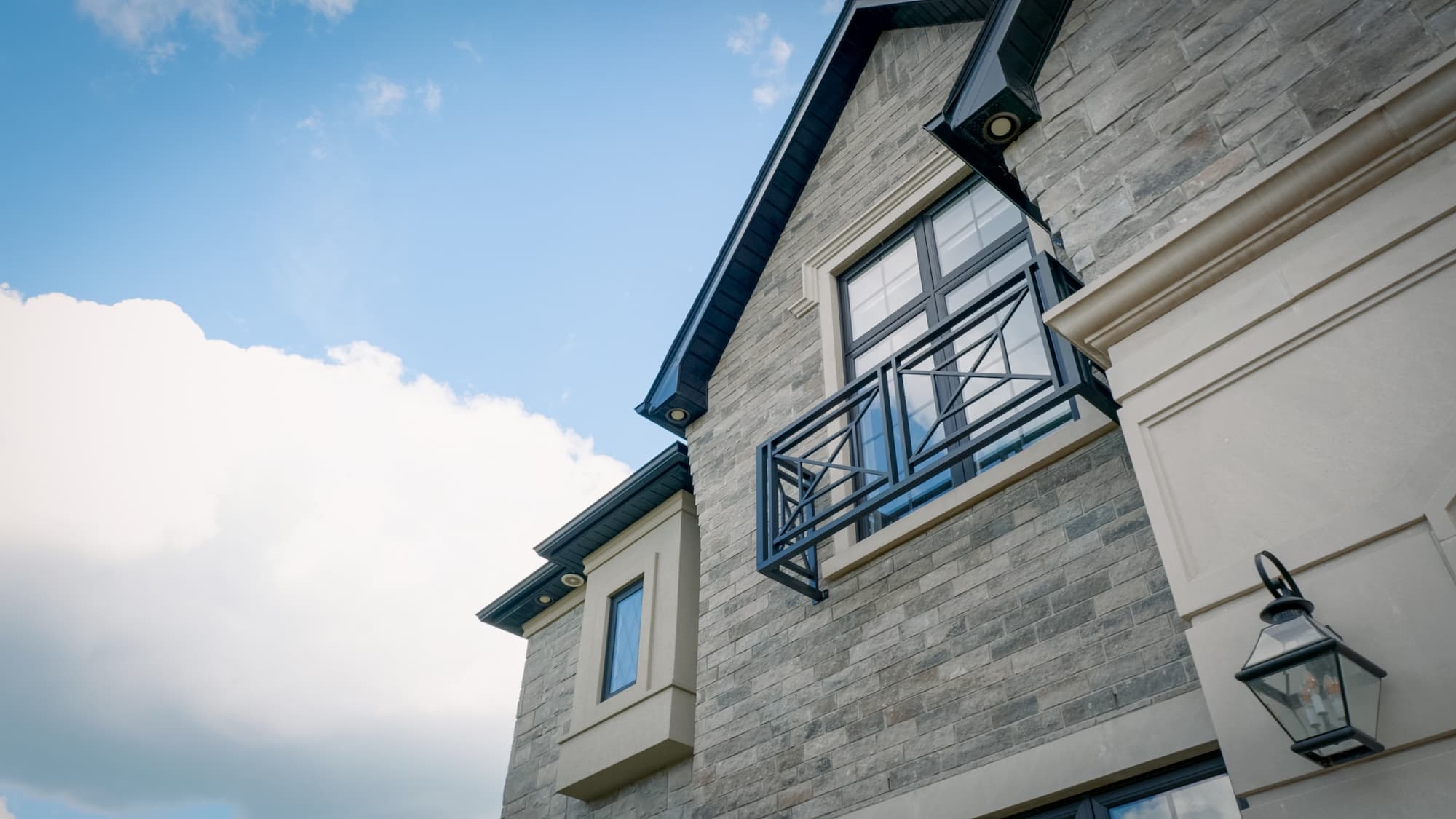 Timberland Homes custom kitchen with marble island and brass fixtures