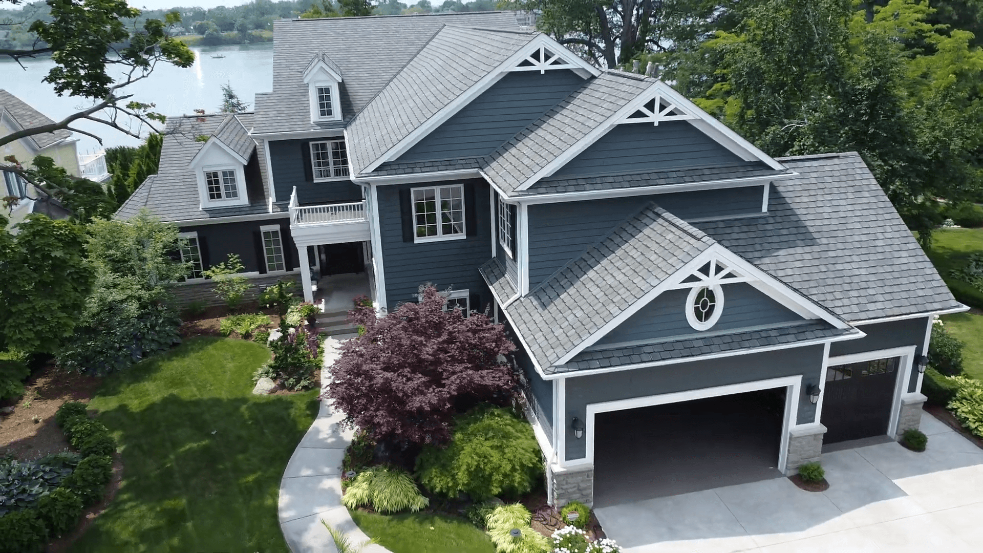 Stone custom home at twilight